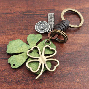 2025 bằng Gỗ Kim Loại cây lá móc khóa phụ nữ túi quyến rũ Mặt dây chuyền thời trang may mắn bốn lá cỏ ba lá Móc Chìa Khóa Xe Quà Tặng Ngày Valentine - Product Image 4