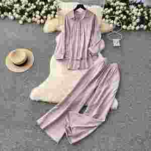 Ensemble décontracté 2 pièces pour femmes, haut asymétrique et ensemble taille haute, survêtements de jogging en gros - Product Image 2