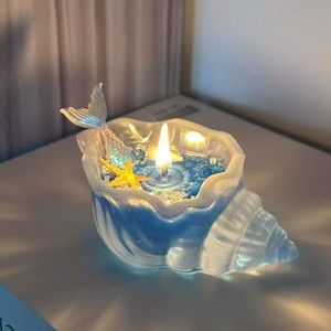Candela Decorativa da Sogno con Cera di Soia Multi-Aromatica a Forma di Spirale Simile a un Cielo Stellato e al Mare in Conchiglia Trasparente - Product Image 1