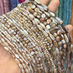Tube de goutte de riz en gros forme ronde <span class=keywords><strong>perles</strong></span> de coquille brune naturelle <span class=keywords><strong>perles</strong></span> de coquille naturelle multi-taille/forme en vrac pour la fabrication de bijoux - Product Image 1