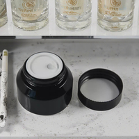 Motif de pot de soins de la peau en verre noir 15g/30g/50g bouchon en plastique pour crème pour les yeux parfum Lotion cosmétiques emballage pour faux cils