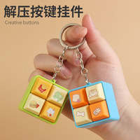 Porte-clés créatif à quatre compartiments avec bouton de mérite, jouet anti-stress, pendentif de sac à dos, vente en gros