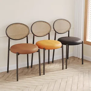 Fashionable rattan back dining chair with soft seat factory direct modern leather seat dining chair