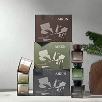 Diffuseur d'huiles essentielles en verre de luxe AIKUN avec bâtonnets en fibre noire et bougie pour parfumer la maison