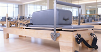 Machine de Pilates Reformer en bois professionnelle pour exercices corporels, idéale pour les salles de sport commerciales, les studios et la remise en forme à domicile