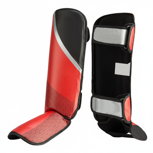 Protège-tibia de sport élégant avec logo personnalisé MUAY THAI MMA Protège-tibias en cuir PU et EVA pour la boxe Protège-tibia - Product Image 1