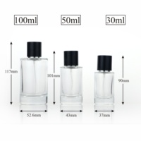 Venta al por mayor 30ml 50ml 100mL botella de perfume de vidrio transparente redonda con tapa plateada