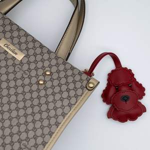 Goreal 2025 nueva llegada bolso de mujer encantos oso de peluche perro juguete caniche cuero muñeca bolso decoración Metal llaveros - Product Image 3