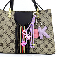 Nouveau porte-clés et pendentif de sac en cuir PU tendance à faire soi-même, avec lettres anglaises A-Z, modèle QM pour femme de bureau