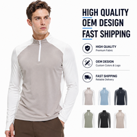 Haut de sport pour homme à col montant, manches longues, blocs de couleur, quart de zip, séchage rapide, respirant, pour la course et la gym, conception OEM personnalisée