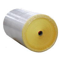 Rouleau géant de papier couché semi-brillant adhésif imperméable, fourni directement par l'usine, pour étiquettes d'expédition, produits d'épicerie et promotion.