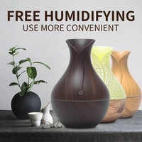 Diffuseur d'huiles essentielles intelligent USB pour la maison avec logo personnalisé, humidificateur d'air ultrasonique avec lumières LED à effet bois