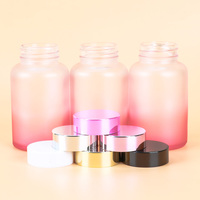 Bouteille en verre vide rose dégradé en gros, sérigraphiée couleur personnalisée avec couvercle à vis