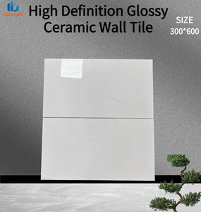 Carrelage mural en céramique gris aspect béton brillant de haute qualité 300x600mm à grain continu pour crédence de cuisine moderne - Product Image 1