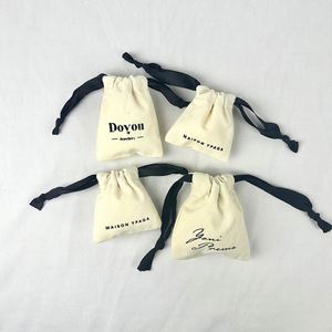 Recyclable Organic Cotton <b>Drawstrings</b> Bags Beige Cotton <b>Pouch</b> with Black <b>Drawstrings</b> for Gift - Product Image 2