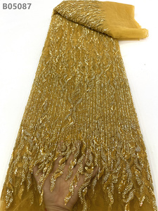Tela de encaje bordado con cuentas Tela de encaje de red floral bordada con cuentas para vestido - Product Image 3