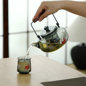 Tetera de vidrio de borosilicato engrosado con tapa, resistente al calor, para preparar té en el hogar, apta para calentar en estufas eléctricas y de cerámica. - Product Image 3