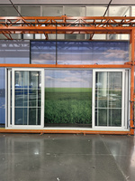 Porte coulissante et relevable en aluminium blanc pour terrasse, triple vitrage Low-e, certifiée NFRC.