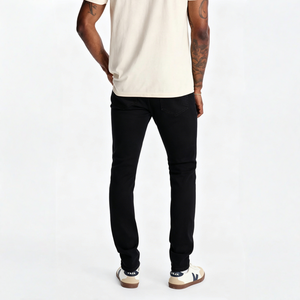 Pantalon en jean slim noir uni extensible et élégant avec déchirures superposées et effilochées pour un look streetwear urbain branché - Product Image 2