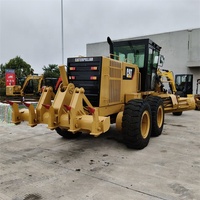 Niveleuse multifonction Caterpillar CAT120K 14 tonnes d'occasion, conforme EPA CE, niveleuse sur roues Cat140 avec pelle, moteur Cat C7 pour travaux de terrassement
