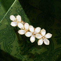 Pince à cheveux élégante de style coréen, pince à ressort haut de gamme pour femme, pince supérieure œil-de-chat de luxe léger, pince pour franges, pince pour cheveux mi-relevés