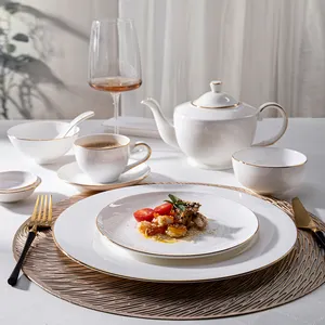 Plate Hotel Set Factory Custom Wholesale Gold Rim Luxury Tableware White Logo Dinner Sets Dubai Royal Fine Bone China Dinnerware