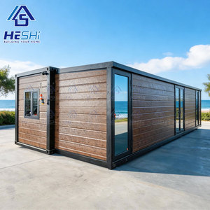 Maison conteneur moderne HESHI 40 pieds, préfabriquée, modulaire et extensible, design rectangulaire pour la vie en extérieur - Product Image 1