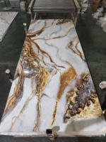 Meilleures ventes en gros : Panneaux muraux décoratifs en PVC imperméables et résistants à l'humidité, type marbre, feuilles de PVC imitation marbre