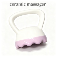 Masseur facial en céramique de style anneau central jaune, outil de massage Guasha pour le visage