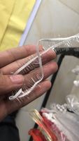 Machine à tricoter en fil de plumes pour la fabrication d'étoles de mode