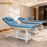 Table de massage électrique avec dossier et repose-jambes réglables, structure métallique, utilisation en salle de sport, salon, mobilier commercial, marque Curtis