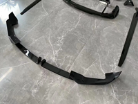 Kit carrosserie style MP noir pour BMW X5 G05 2023+ LCI, comprenant lèvre avant, lèvre arrière, jupes latérales et spoiler de toit, aspect carbone