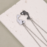 Collier en alliage Tai Chi Bagua Poisson, pendentif Yin Yang noir et blanc, chaîne maille forçat, accessoires minimalistes pour couple, vente en gros