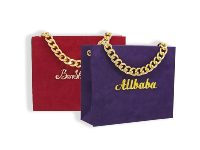 Sac en papier de luxe personnalisé avec poignée en métal et œillet pour emballage cadeau et shopping
