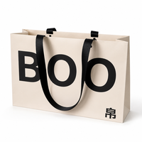 Sac shopping en papier personnalisé avec ruban rose et impression de logo pour boutique de vêtements féminins, emballage de vente au détail