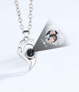 Go Party <span class=keywords><strong>HOT</strong></span> i-love-You 100 langue <span class=keywords><strong>Couple</strong></span> collier titane en acier en forme de cœur Attraction magnétique <span class=keywords><strong>Couple</strong></span> colliers assortis - Product Image 4