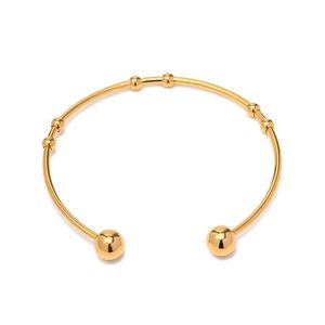 Brazalete Abierto Ajustable de Acero Inoxidable Minimalista con Cuentas Geométricas Cristianas Chapado en Oro de 18K Fanyue para Mujer - Product Image 6