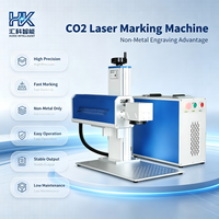 Machine de marquage laser CO2 stable Huike pour la gravure de logos sur boîtes en bois, étiquettes suspendues en papier et ceintures en cuir