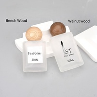 Vente en gros de flacons de parfum en verre givré plat de luxe de 30 ml, flacon atomiseur de parfum rechargeable avec bouchon en bois