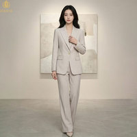 Costume pour femme en abricot anti-plis OEM ODM, ensemble pantalon large et blazer élégant extensible et lisse pour affaires