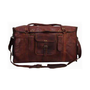 Un compañero de viaje versátil. Esta bolsa de lona 100% de cuero genuino es ideal para sesiones de gimnasio, viajes por carretera y vacaciones cortas. - Product Image 2