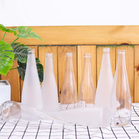 OSHOW Gros 330ml Dépoli En Forme De Goutte de Fruits Jus De Vin Vodka Evian Bouteille En Verre Avec Bouchon À Vis
