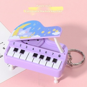 Jincan Factory Wholesale New Mini Bench Piano Keychain Music Piano Game Machine Bag Pendant Educational Toy Gift for Children - Product Image 6