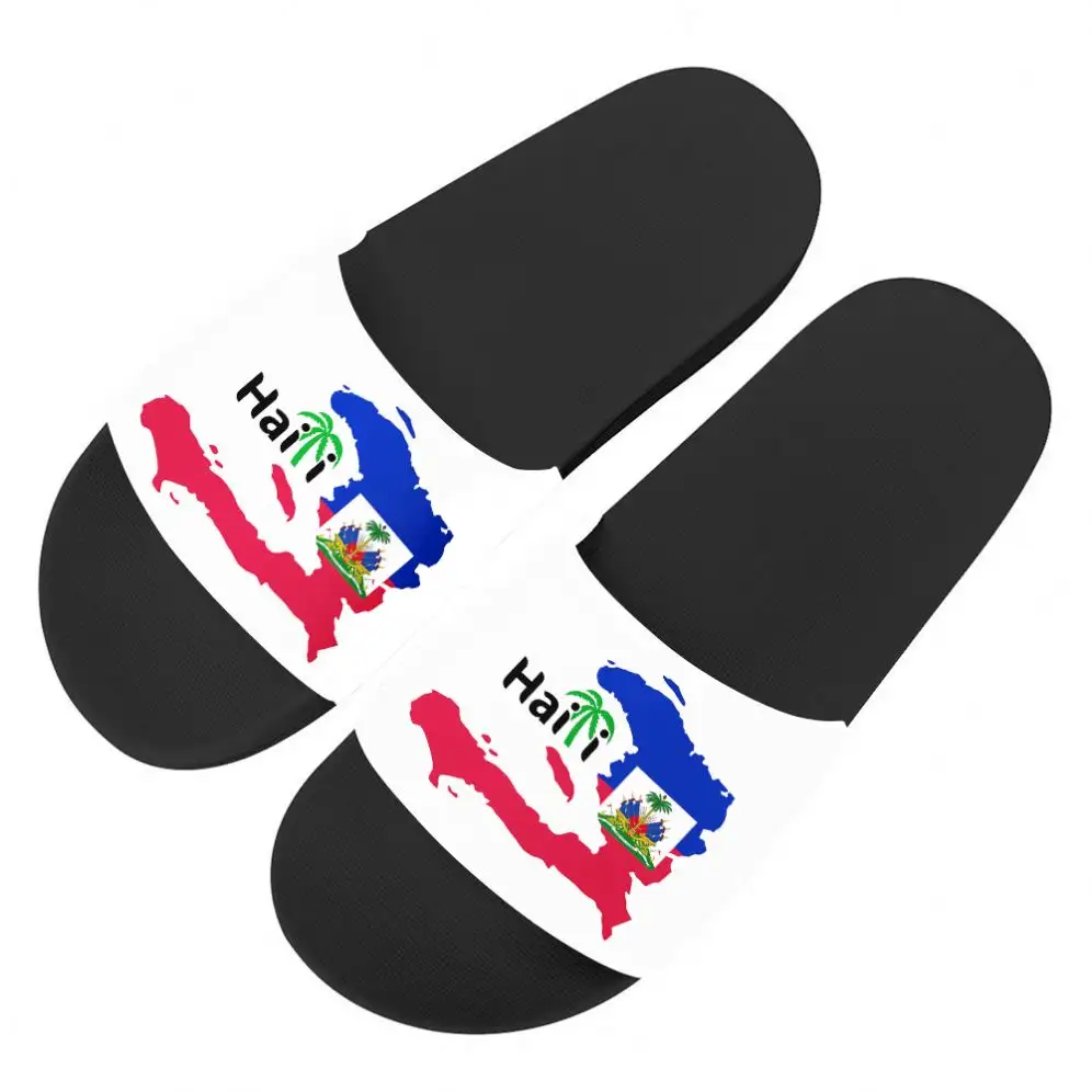MOQ1 फैक्टरी थोक महिलाओं को पुरुषों चप्पल हैती झंडा डिजाइन स्लाइड सैंडल हाईटियन सैंडल जूते सफेद काले तलवों जोड़ों के लिए