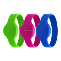 Bracelets RFID ovales en silicone écologique imperméable 13,56 MHz HF, bracelet fixe pour poignet, diamètre 60 mm 65 mm, pour station balnéaire, station de spa