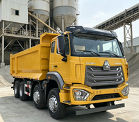 Truk Dump Bekas HOWO 8X4 Kilometer Rendah 351-450HP Kapasitas Muatan >50T Chassis Stabil Pengangkatan Hidrolik untuk Infrastruktur