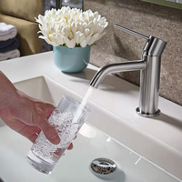 Robinet de lavabo monocommande chaud/froid en acier inoxydable avec cartouche céramique et débit contrôlé