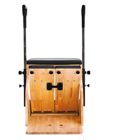 Chaise Wunda de Pilates en bois de chêne pour studio, à résistance divisée, pour la précision et la stabilité du mouvement