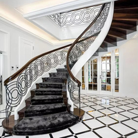 Escaliers incurvés en fer forgé personnalisés, luxueux et magnifiques, avec éclairage LED pour la maison, provenant d'un fournisseur d'escaliers de Foshan
