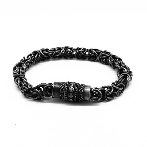 Yunnique – Bracelet en acier inoxydable noir pour hommes, design croisé, fermoir magnétique, style vintage, bijoux, cadeau - Product Image 1